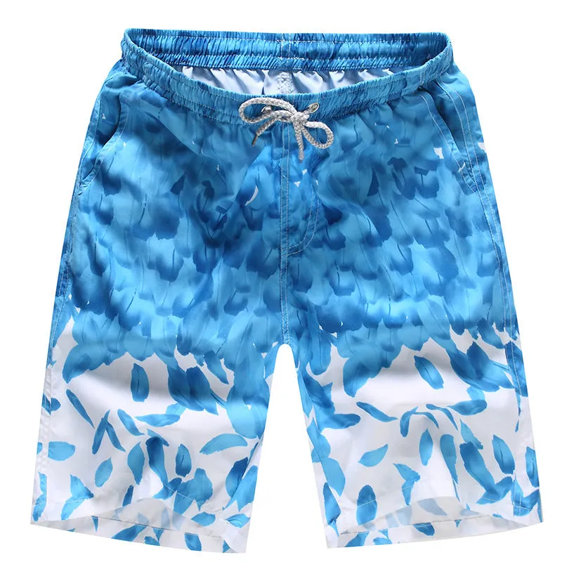 Men's loose five-point beach shorts in colourful feather print on thin cotton fabric