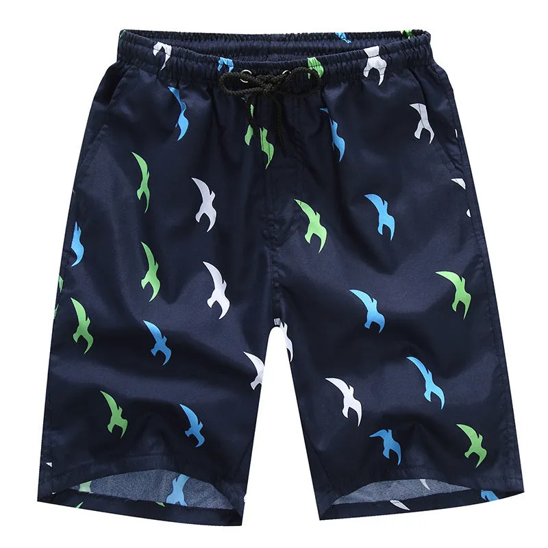 Men's loose five-point beach shorts in colourful feather print on thin cotton fabric
