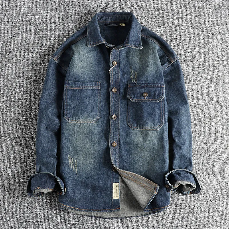 Men's light blue vintage denim shirt with loose fit and long sleeves