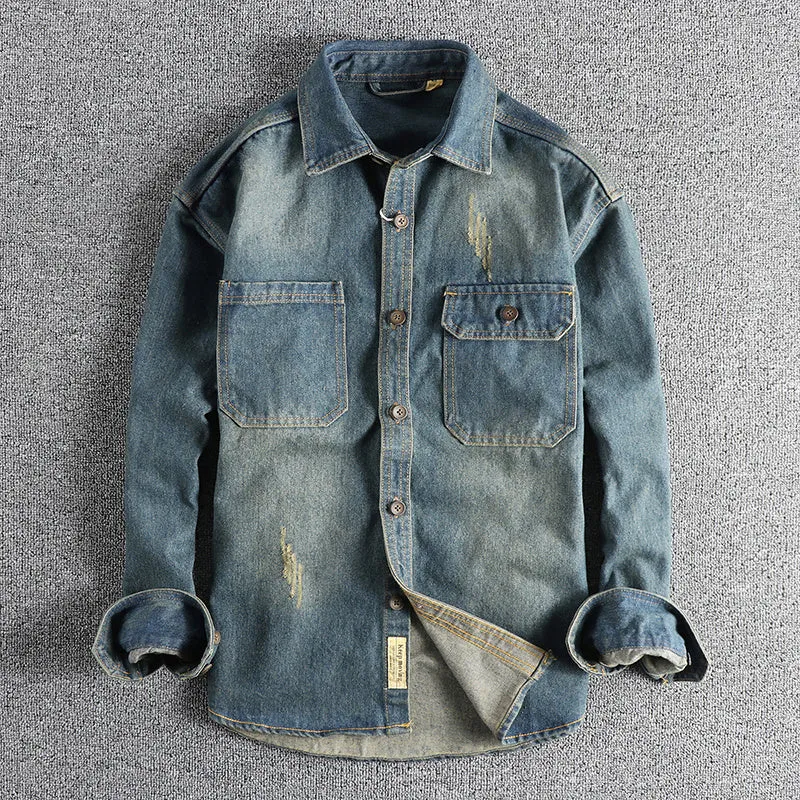 Men's light blue vintage denim shirt with loose fit and long sleeves