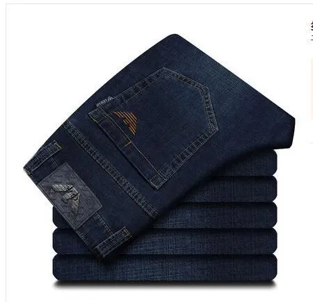 Men's elastic business straight jeans in 8151 blue wash with worn white finish, zipper fly, and pocket details