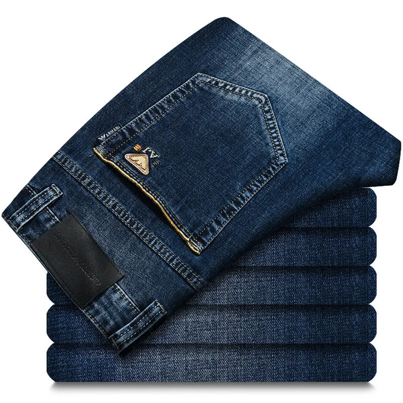 Men's elastic business straight jeans in 8151 blue wash with worn white finish, zipper fly, and pocket details