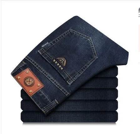 Men's elastic business straight jeans in 8151 blue wash with worn white finish, zipper fly, and pocket details