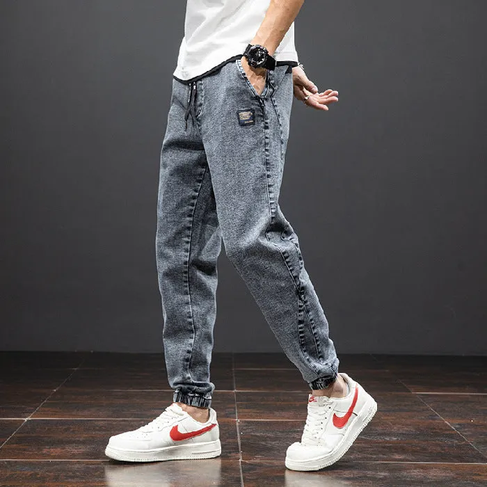 Men's cropped oversized slimming straight leg jeans in black, grey, and blue with high elasticity cotton blend