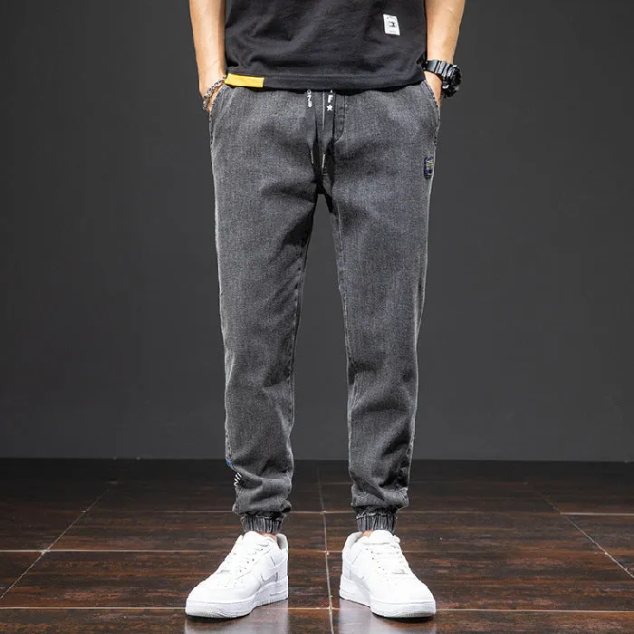 Men's cropped oversized slimming straight leg jeans in black, grey, and blue with high elasticity cotton blend