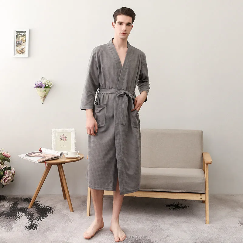 Women's and men's polyester nightgown cardigan with three-quarter sleeves in HFG navy blue, shown on a model for sleepwear use