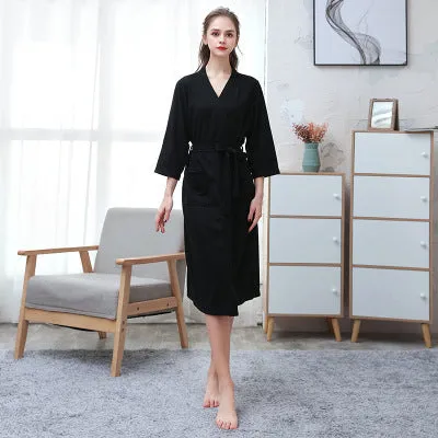 Women's and men's polyester nightgown cardigan with three-quarter sleeves in HFG navy blue, shown on a model for sleepwear use
