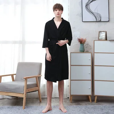 Women's and men's polyester nightgown cardigan with three-quarter sleeves in HFG navy blue, shown on a model for sleepwear use