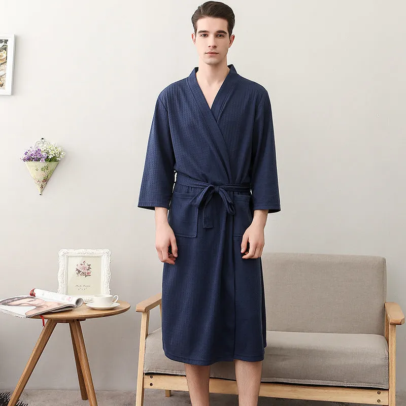 Women's and men's polyester nightgown cardigan with three-quarter sleeves in HFG navy blue, shown on a model for sleepwear use