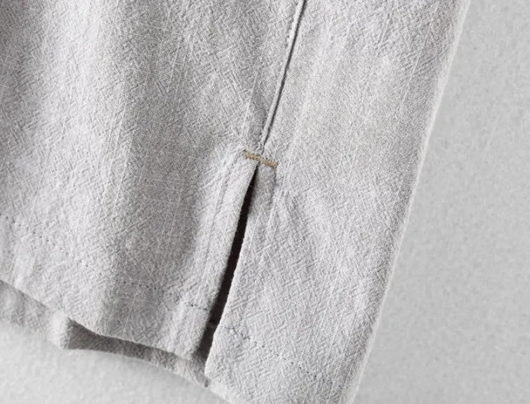 Men's loose fit cotton and linen casual shirt in a solid colour, shown in light grey.