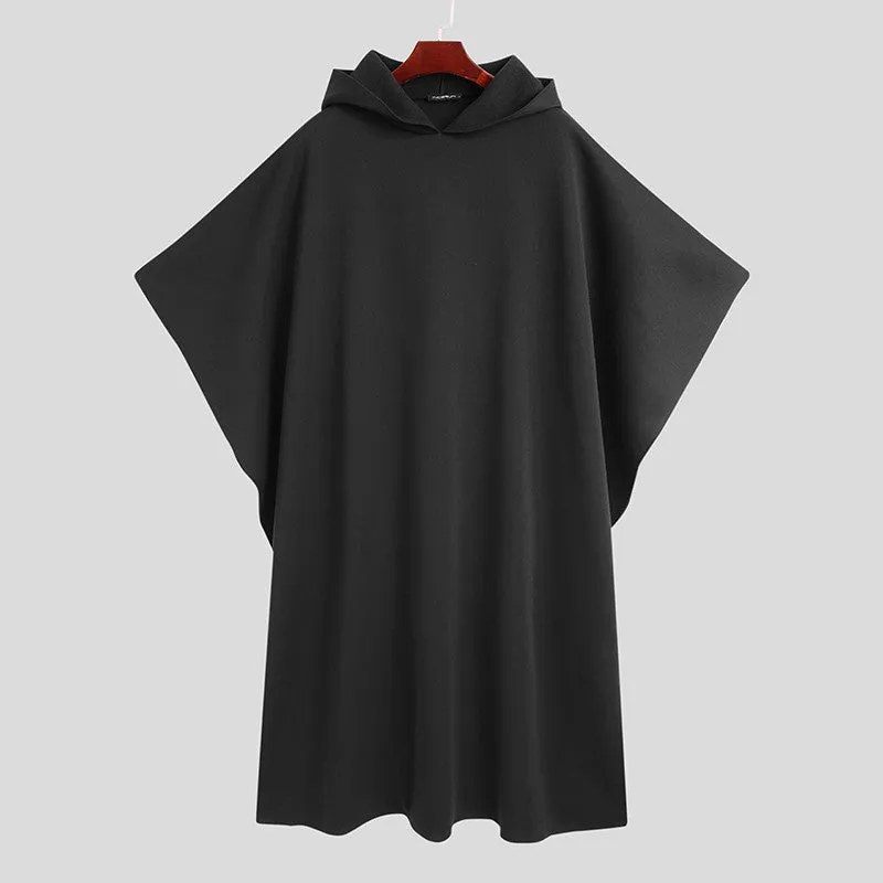 Men's solid black hooded cloak coat with loose streetwear punk fit, front view