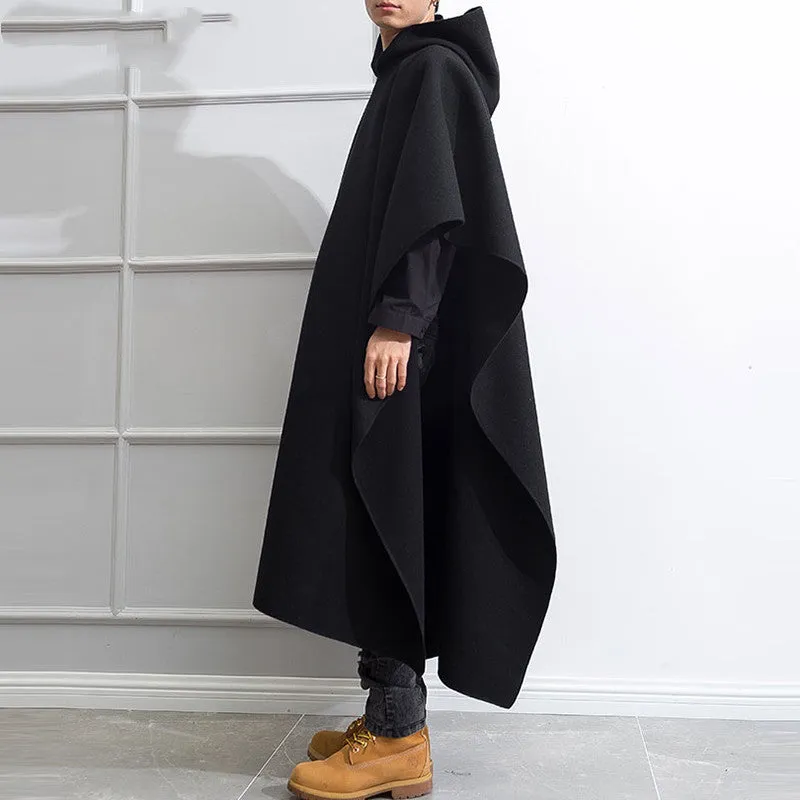 Men's solid black hooded cloak coat with loose streetwear punk fit, front view