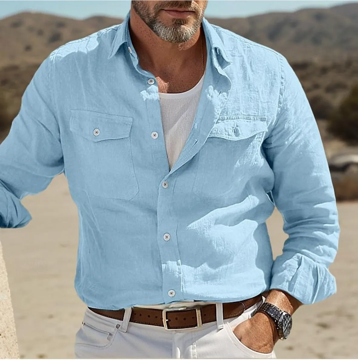 Men's long-sleeved casual button-up shirt in a cotton linen blend, shown in a loose fit.