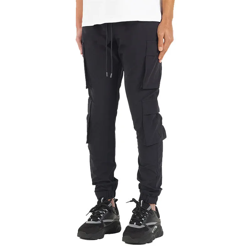 Men's stretch breathable nylon ankle banded sports slacks in black, for fitness and leisure