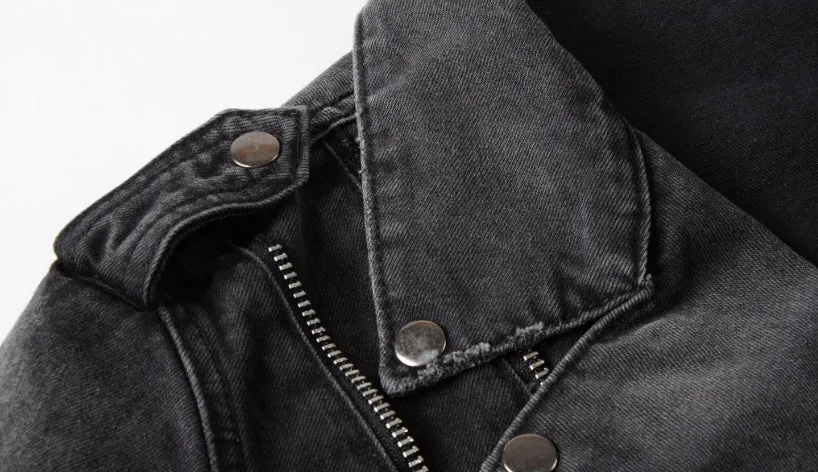 Black slim fit linen denim jacket with zipper front, zipper pockets, and lapel collar on a person