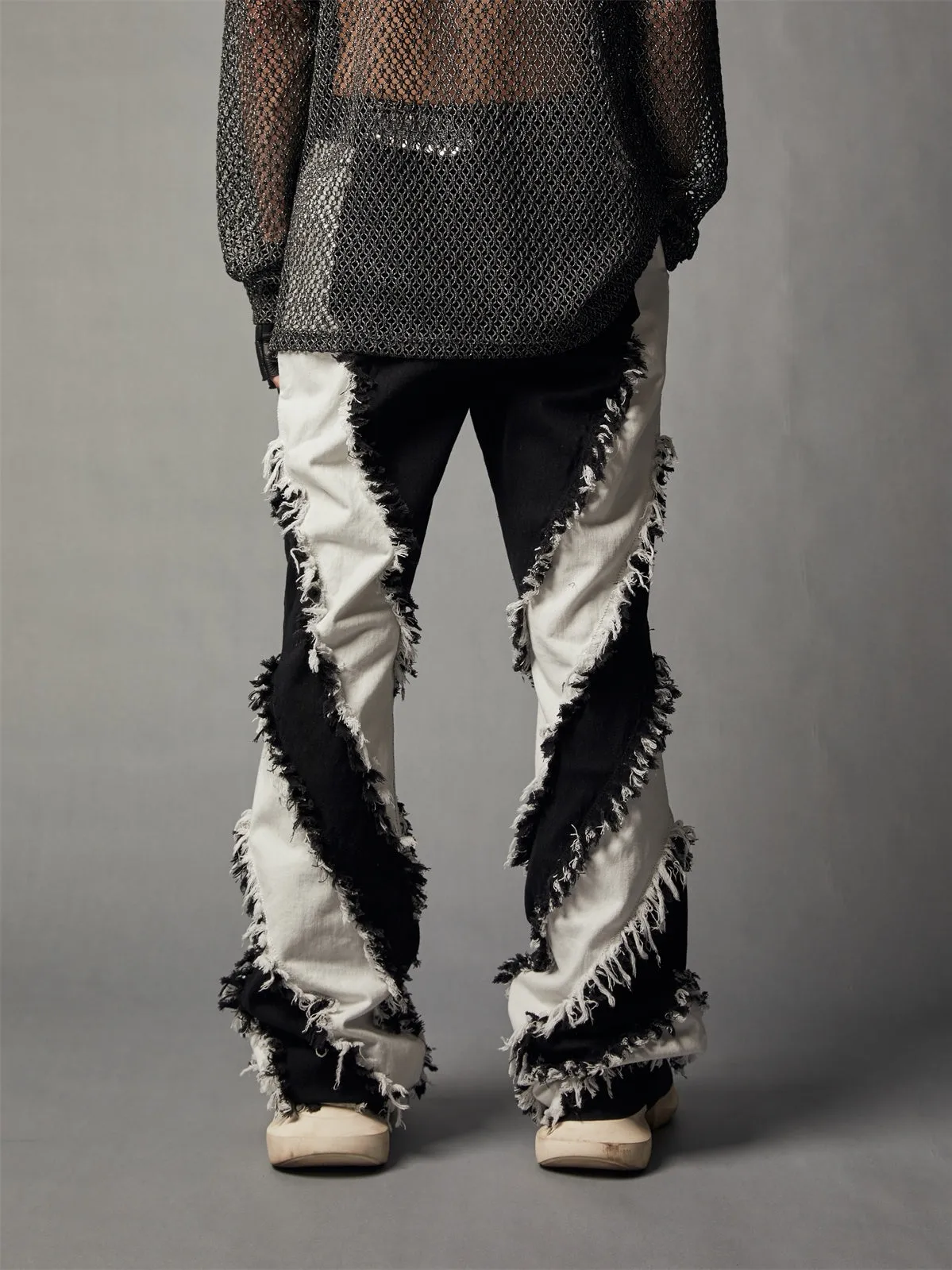 Black and white patchwork slim fit rough edge washed jeans for men in denim fabric