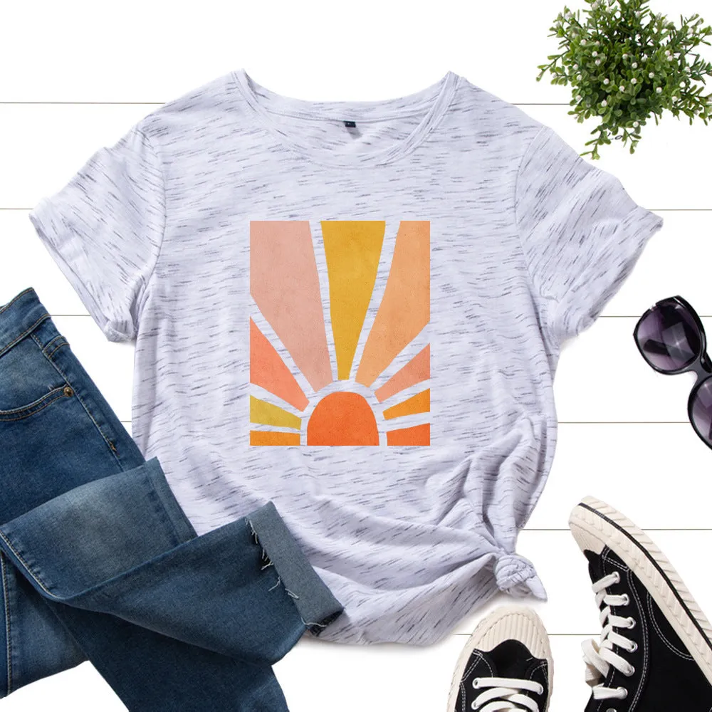 Women's cotton graphic tee with short sleeves and crew neck featuring a printed sun scenery and flower design