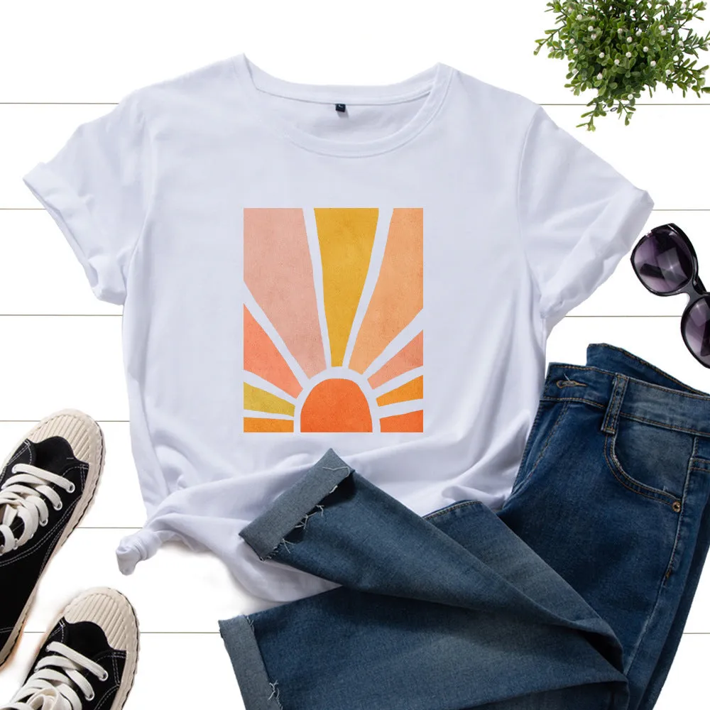 Women's cotton graphic tee with short sleeves and crew neck featuring a printed sun scenery and flower design