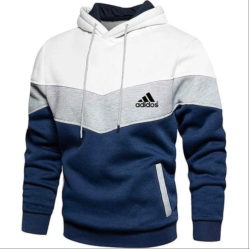 Men's patchwork hooded sweatshirt in blue with a loose fit, long sleeves, and hood.