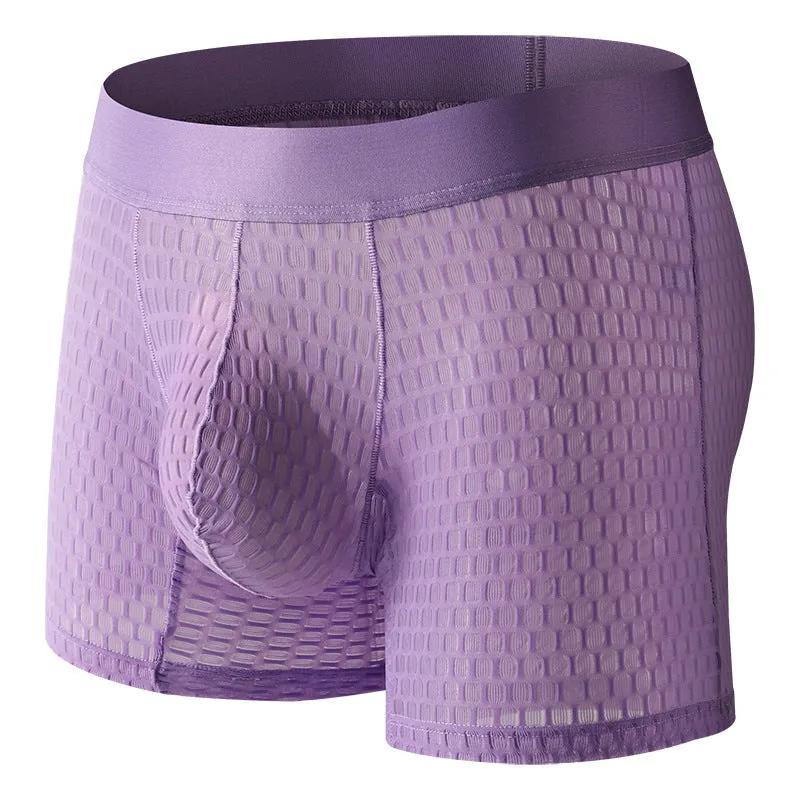 Men's white lace mesh boxer shorts with low waist design on a flat lay.