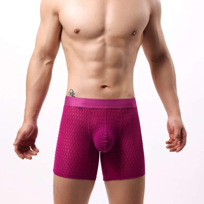 Men's white lace mesh boxer shorts with low waist design on a flat lay.
