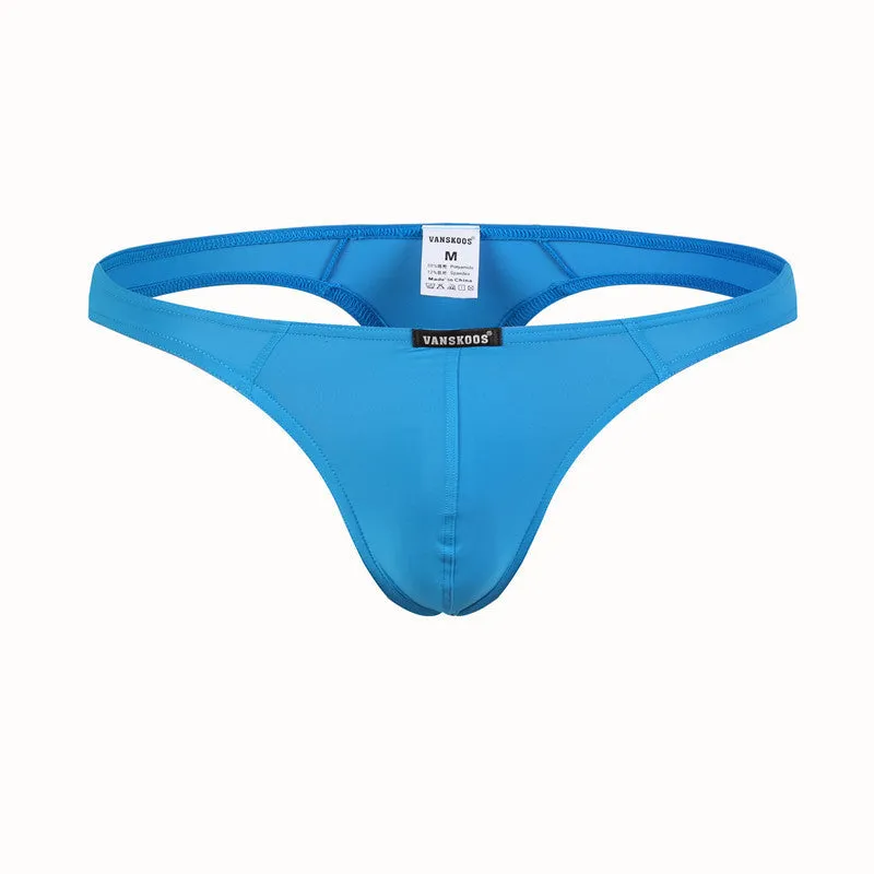 Men's low waist T-shaped bikini swimming trunks in solid colour nylon fabric, front view.