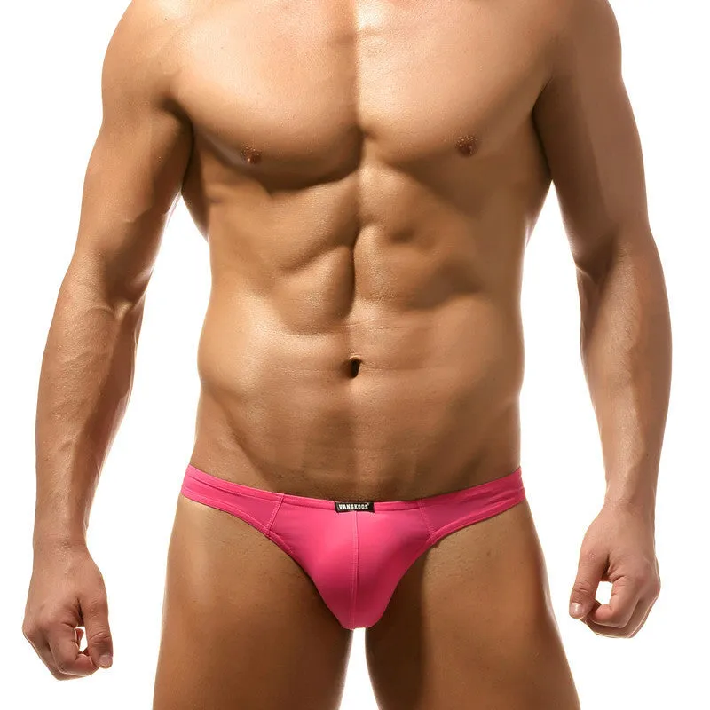 Men's low waist T-shaped bikini swimming trunks in solid colour nylon fabric, front view.