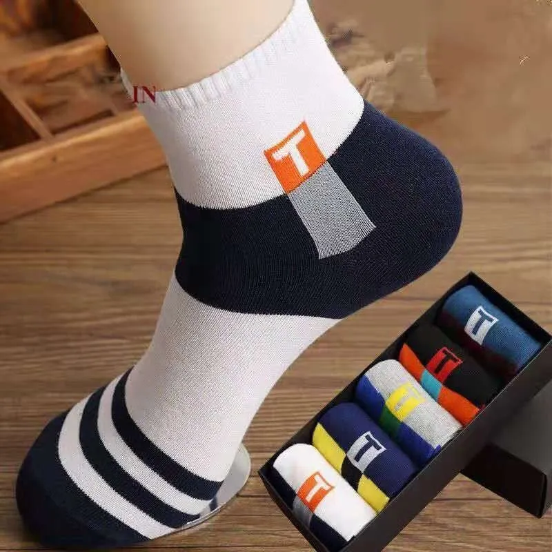Sports mid-calf basketball deodorant men's socks in tube style with simple design and breathable fabric.