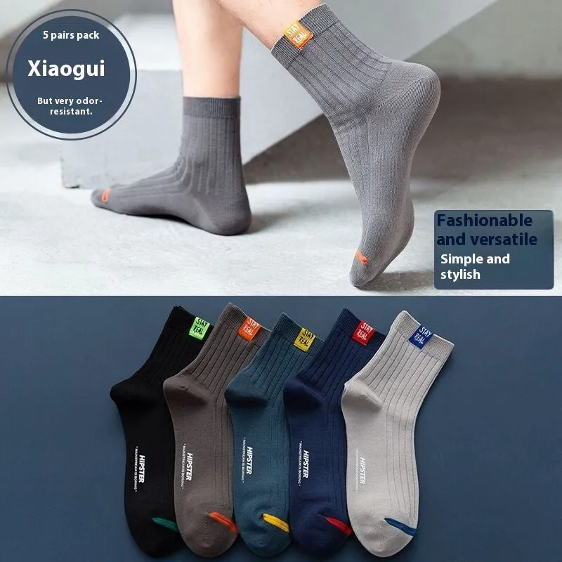 Sports mid-calf basketball deodorant men's socks in tube style with simple design and breathable fabric.