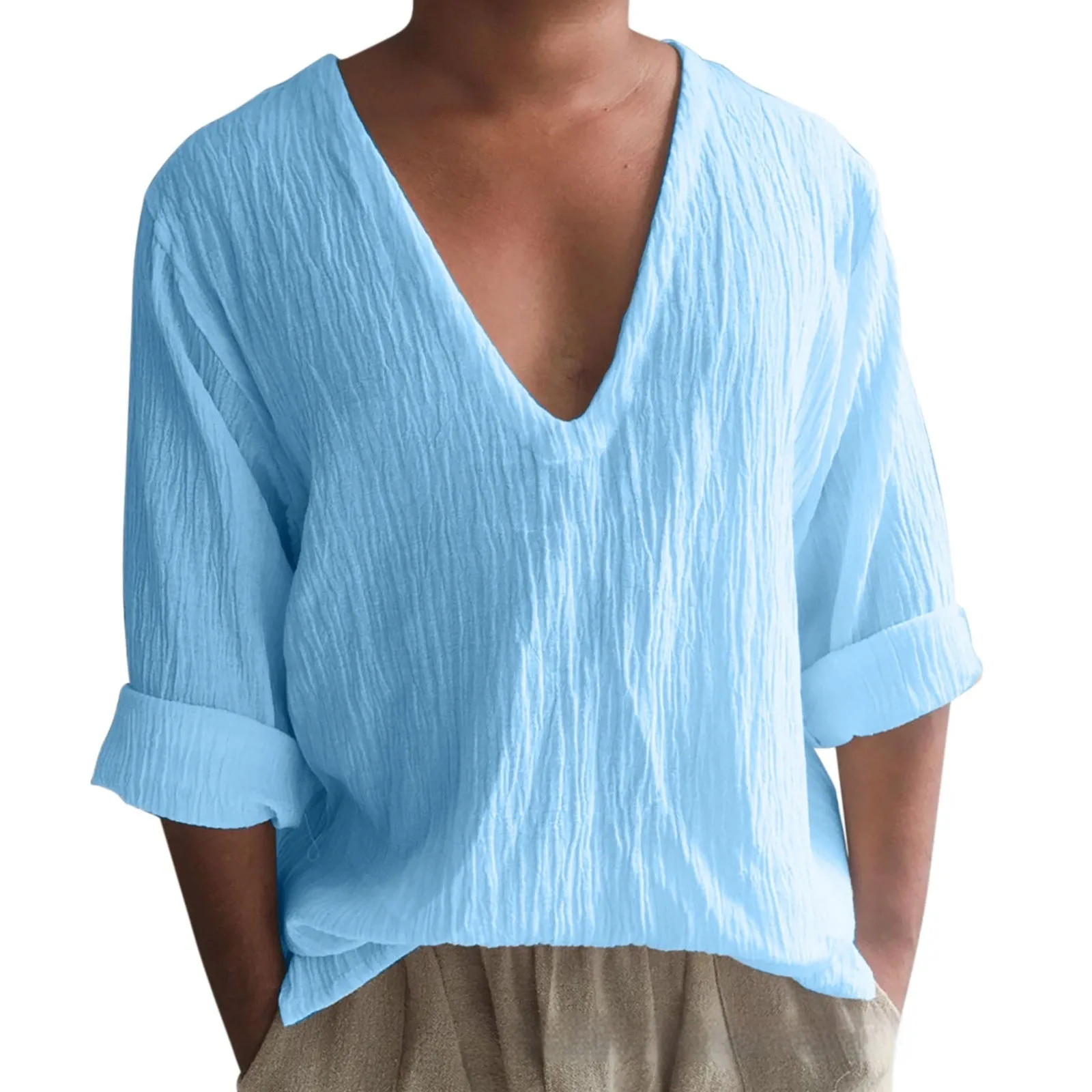 Man wearing a washed cotton long sleeve V-neck t-shirt in a solid colour.