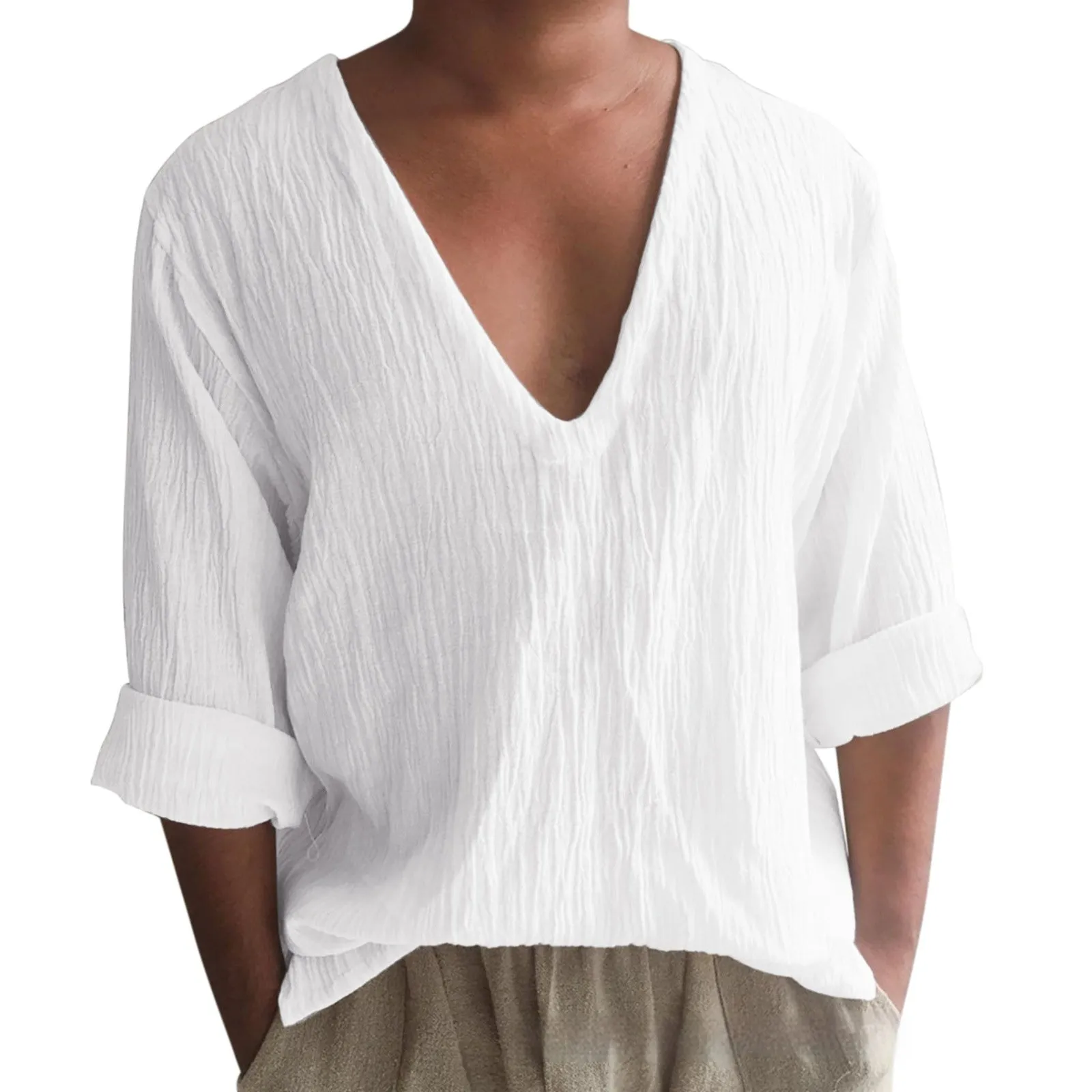 Man wearing a washed cotton long sleeve V-neck t-shirt in a solid colour.