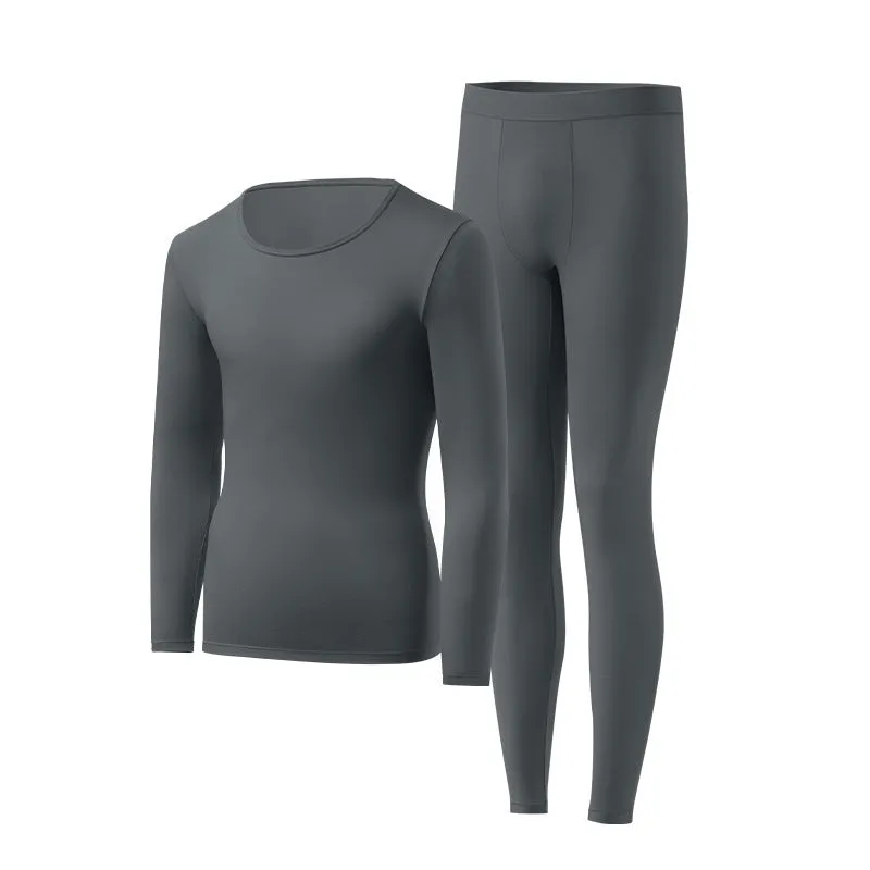 Men's constant temperature heating nylon bottoming suit in black with top and trousers on model