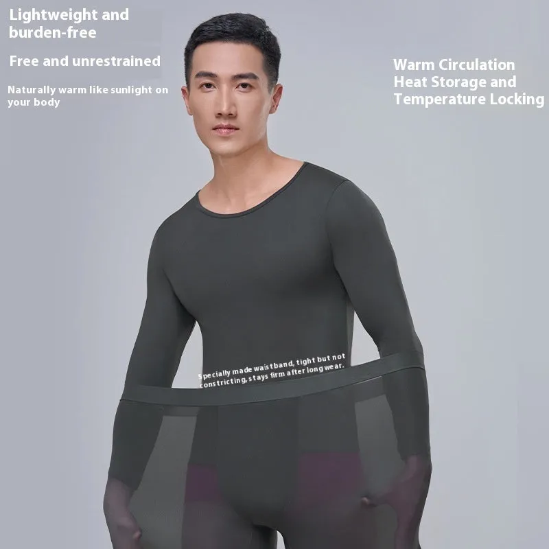 Men's constant temperature heating nylon bottoming suit in black with top and trousers on model