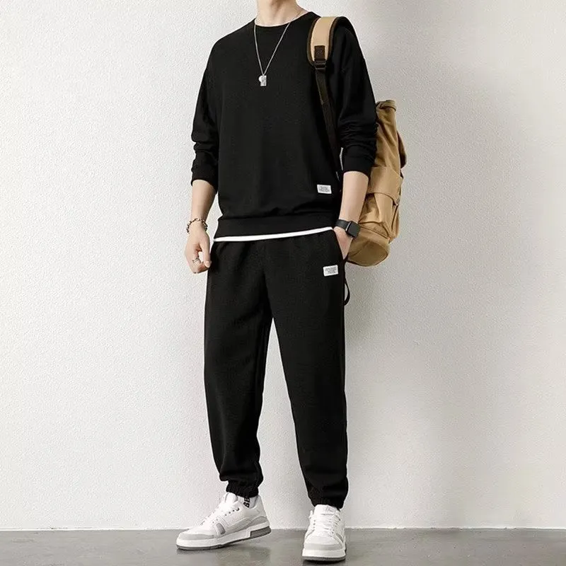 Long-sleeved waffle tracksuit set in nine colours, sizes L to 5XL, chemical fibre blend.