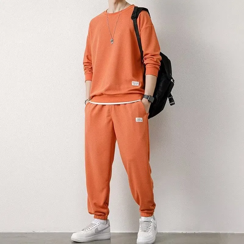 Long-sleeved waffle tracksuit set in nine colours, sizes L to 5XL, chemical fibre blend.