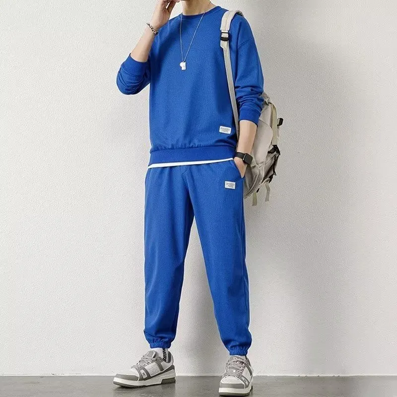 Long-sleeved waffle tracksuit set in nine colours, sizes L to 5XL, chemical fibre blend.