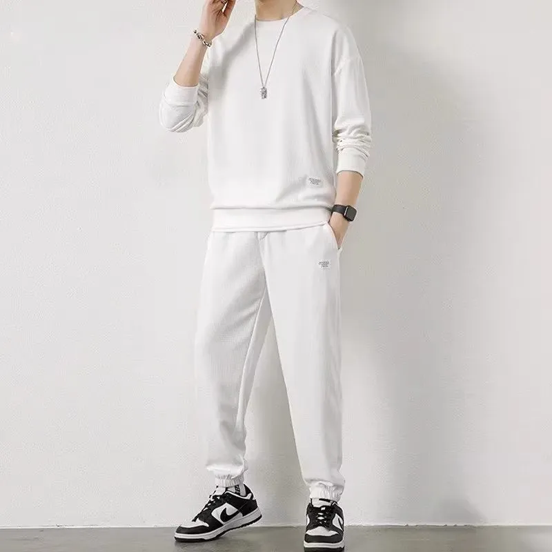 Long-sleeved waffle tracksuit set in nine colours, sizes L to 5XL, chemical fibre blend.