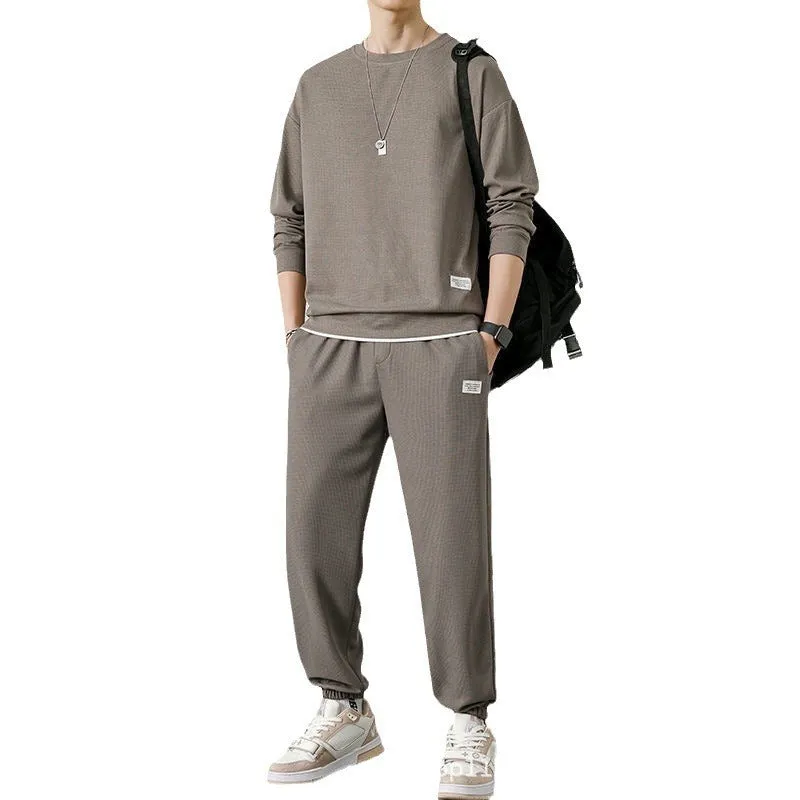 Long-sleeved waffle tracksuit set in nine colours, sizes L to 5XL, chemical fibre blend.