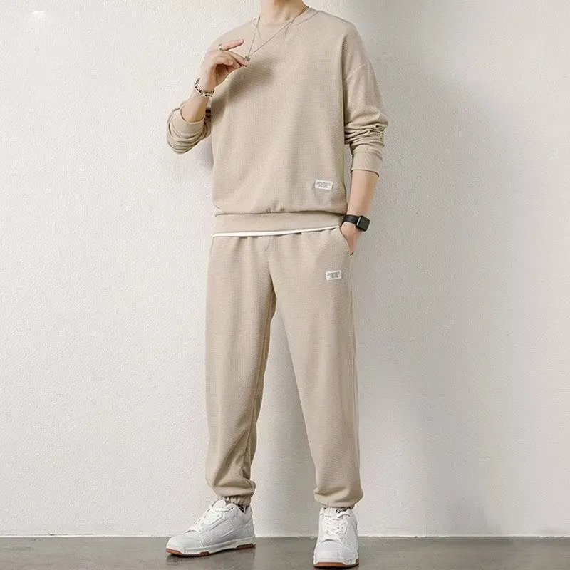 Long-sleeved waffle tracksuit set in nine colours, sizes L to 5XL, chemical fibre blend.