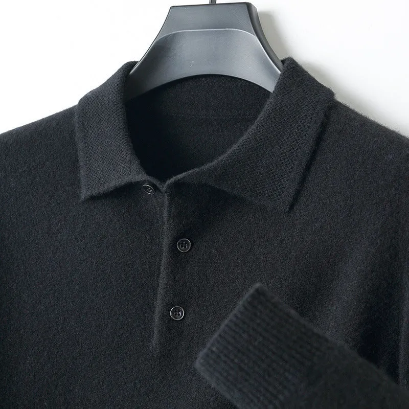 Man wearing a grey woolen polo collar sweater pullover with long sleeves.