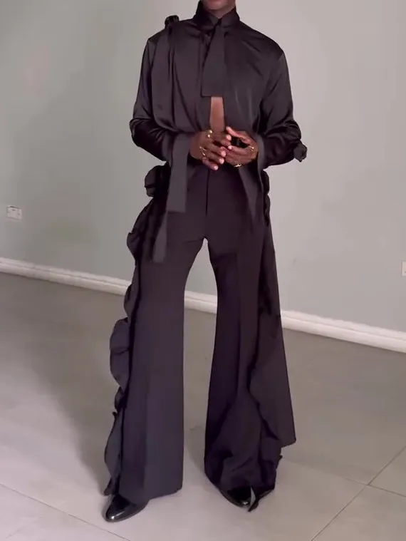 Men's black hollow cut out shirt and high waist pants suit set on display, polyester fabric, regular fit
