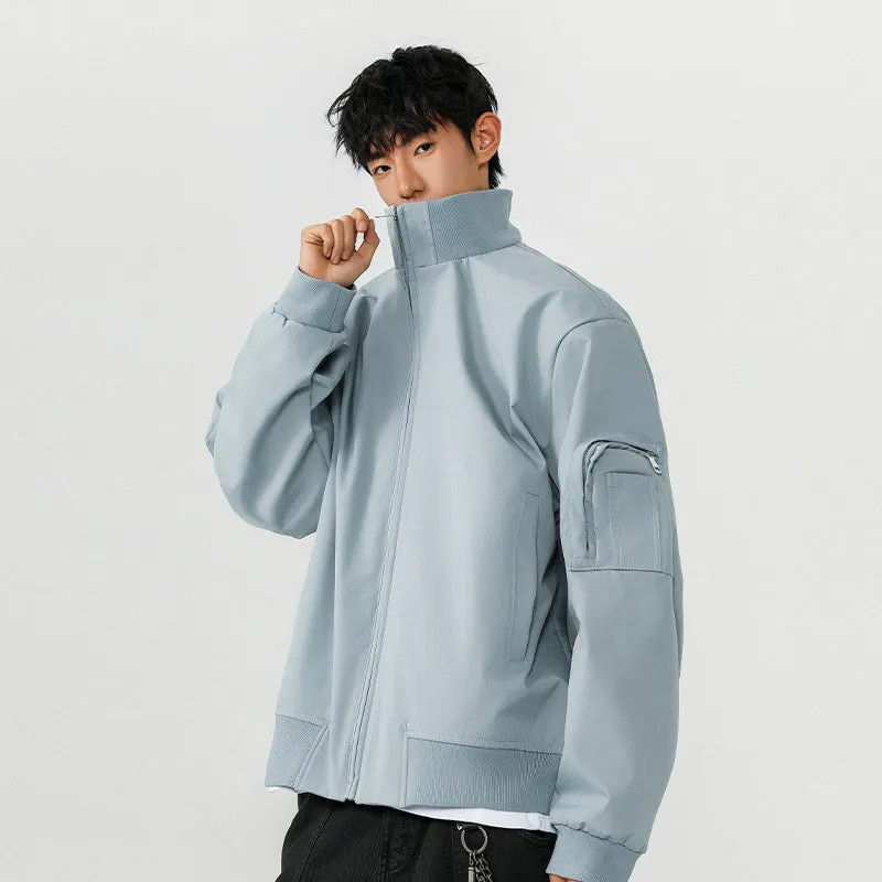 Men's large size multi-pocket short flight jacket in black, loose fit, polyester fiber fabric with visible pockets.