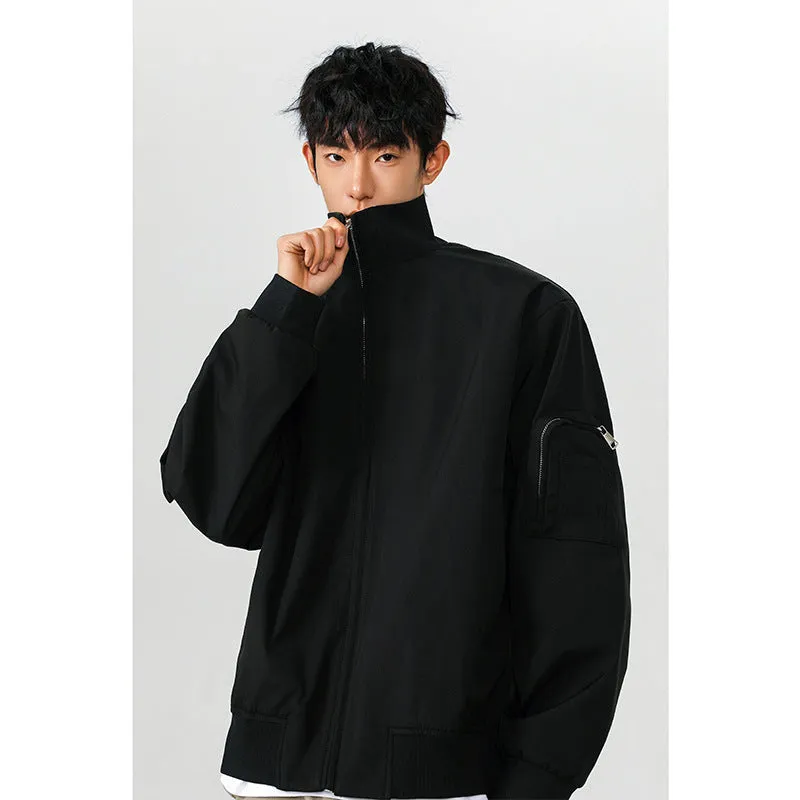 Men's large size multi-pocket short flight jacket in black, loose fit, polyester fiber fabric with visible pockets.