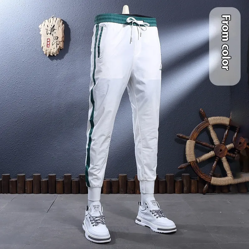 Ice silk breathable stretch slim-fit ankle-tied skinny sports trousers for men, black stripe design