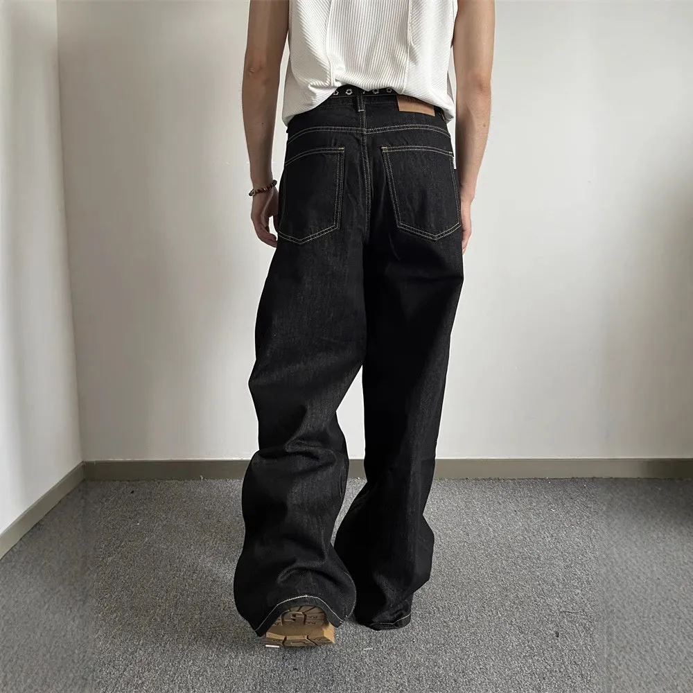 Black retro wide-leg denim jeans with straight-leg design and zip placket