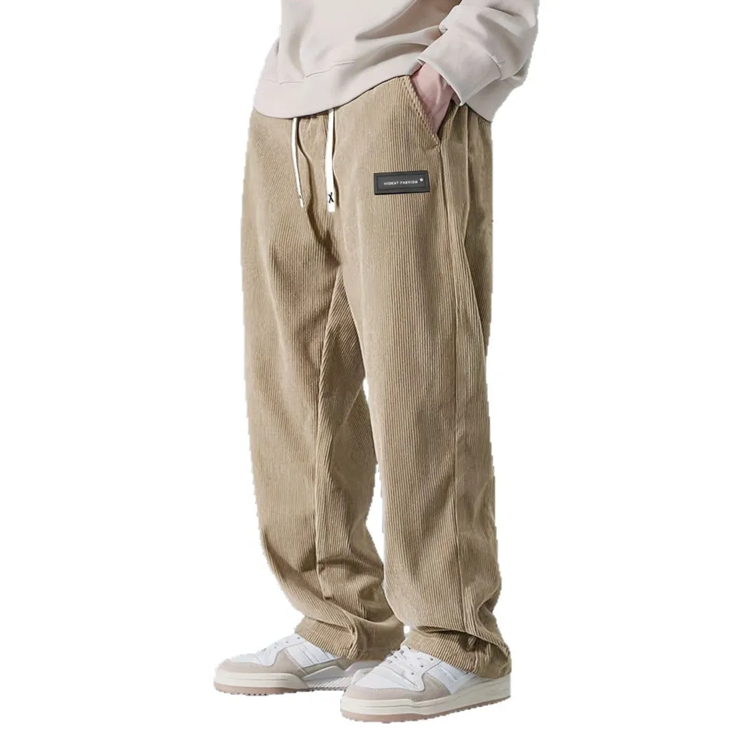 Men's corduroy straight-leg trousers in khaki with drawstring waist on a model, front view
