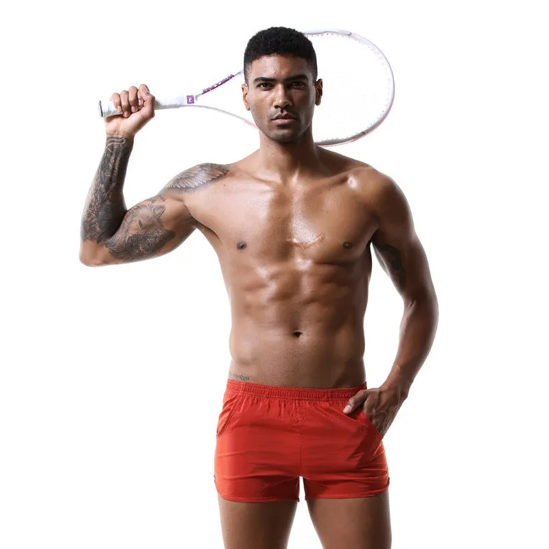 Woven men's nylon low-waist boxer shorts in solid colour, breathable casual style