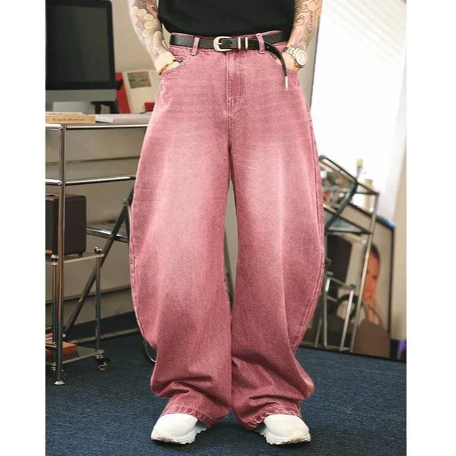 Men's brown washed loose flared jeans with low waist and zipper fly, side view