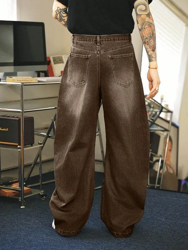 Men's brown washed loose flared jeans with low waist and zipper fly, side view