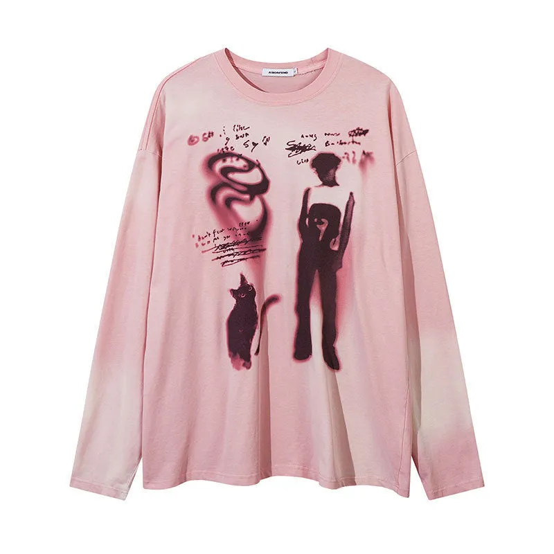 Women's loose grey cotton top with drop-shoulder sleeves and printed letter design.